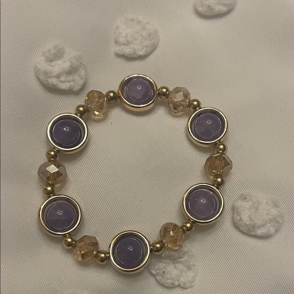 Elegant Gold and Purple Bracelet